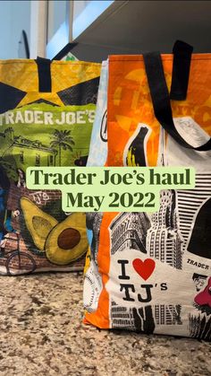 two bags with the words trader joe's haul on them