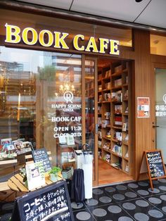 the book cafe is open and ready for customers to use it's doors as their menus