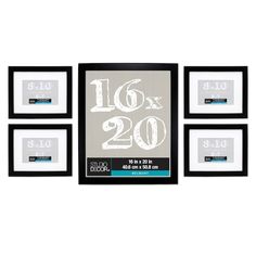 four black and white framed pictures hanging on a wall with the number twenty six 20