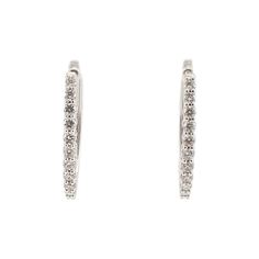 Gender: Ladies  Metal Type: 14K White Gold  Length: 0.75 inches  Width: 17.00 mm  Weight: 3.27 grams  14K White Gold diamond hoop huggy-style earrings with "earring lock" post/back system. The metal was tested and determined to be 14K white gold. Engraved with "14K". In excellent condition.  Pre-owned. Might show minor signs of wear.  Shared-Prong Set in 14 Karat White Gold with:  Twenty-two (22) round brilliant cut natural diamonds:  Measurements: 1.50mm - 1.95mm in diameter x ~1.05mm in depth. Formal Minimalist Oval Huggie Earrings, Timeless Oval White Gold Hoop Earrings, Diamond White Oval Hoop Earrings For Formal Occasions, Minimalist Formal Hoop Earrings With Prong Setting, Minimalist Hoop Earrings With Prong Setting For Formal Occasion, Minimalist Hoop Earrings With Prong Setting For Formal Events, Minimalist Hoop Earrings For Formal Events, Timeless Oval Hoop Earrings For Anniversary, Formal Oval Hoop Earrings With Diamond Accents