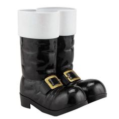 a pair of black and white boots with gold buckles