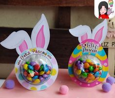 there are two bunny ears candy dispensers on the table