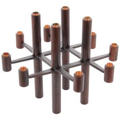 a group of wooden candles sitting on top of each other