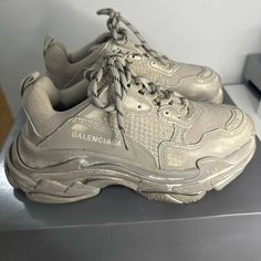 This Pair Of Balenciaga Triple S Low Top Sneakers Are Luxury Street Ware At Its Finest. Elevate Any Look Sporting These! Also Include Extra Pair Of Laces And Storage Shoe Bag! Fits True To Size, Order Your Normal Size Padded Tongue And Collar For Optimal Comfort Tpu Injected Sole To Create Bubble For Comfort And Shock Absorbing Lace Up Logo Embroidery At Side, Debossed "Triple S" At Tongue Tonal Textured And Mesh Panels Embroidered Size At The Edge Of The Toe Pull-On Tab At Back And Tongue Bicol Designer Metallic Low-top Sneakers, Designer Low-top Platform Sneakers, Balenciaga Triple S White, Balenciaga Track Trainers, Chunky Dad Sneakers, Balenciaga Track Sneaker, Street Ware, Balenciaga Track 2, Balenciaga Track Sneakers