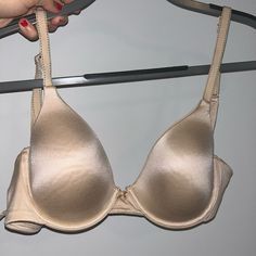 Worn Once! No Wear Or Tear, Practically Brand New, Just Slightly Big On Me. Material Is Buttery Soft And Super Comfortable! Color Is A Light Tan/Dark Nude Color Perfect Condition. Feel Free To Offer Or Ask Questions :) Elegant Fitted Bra With Soft Touch, Elegant Fitted Soft Touch Bra, Solid Color Seamless Low-cut Bra, Beige Padded Underwire Bra, Cheap Nude Push-up Intimates, Beige Underwire Seamless Bra, Cheap Low-cut Nude Bra, Satin Bra, Wear Or Tear