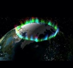 an image of the earth with colorful lights on it's side and in the middle