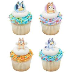 four cupcakes with cartoon characters on top of them and sprinkles