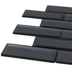 black glass subway tile backsplashes