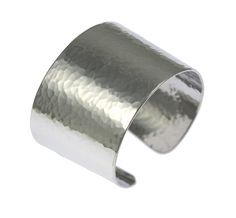 The Hammered Aluminum Cuff Bracelet is sure to be one of the most versatile pieces in your wardrobe. You can wear it on its own to keep your look simplified or wear it with coordinating thin bangles for a chic layered look. Its sleek look and simple lines will make it perfect for pairing with many different types of outfits. Picture it with a strapless dress for night or with a cap sleeve t-shirt in the summer, or roll up the sleeves of a leather jacket or blazer and slip on the bracelet to put 10th Anniversary Gifts, Aluminum Jewelry, 10th Anniversary, Bracelet Argent, Sleek Look, Simple Lines, Layered Look, Copper Jewelry, Arm Band