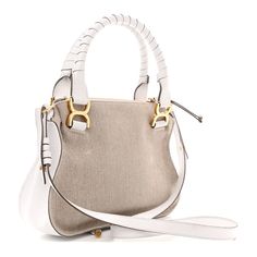 This is an authentic CHLOE Canvas Calfskin Small Marcie Satchel in White. This stylish satchel is crafted of beige canvas and calfskin leather in white. The bag features wrapped leather handles on either side with a frontal flap pocket, aged brass hardware, and an optional shoulder strap. The top zipper opens to a beige fabric interior with a zipper pocket. Aged Brass Hardware, Beige Fabric, Aged Brass, Leather Handles, Brass Hardware, Blue Bags, Leather Handle, Flap Pocket, Saddle Bags