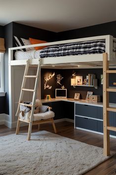 a bunk bed with a desk underneath it and a ladder to the top that leads up