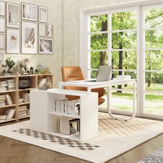 a room with a desk, bookshelf and pictures on the wall