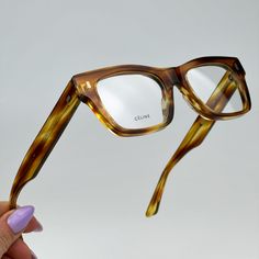 Celine Cl50011i 056 Brand New Eyeglasses Striped Honey Havana Square Women Same/Next Day Shipping! Brand New And 100% Authentic! Made In Italy. Brand: Celine Model Number: Cl50011i Color Code: 056 Gender: Women Frame Shape: Square Frame Color: Striped Honey Havana Frame Material: Acetate Frame Type: Full Rim Lens Color: Demo Lens Material: Customisable Size: 48x18x145 Full Retail Celine Package: 1. Glasses 2. Flat Branded Case 3. Cleaning Cloth With Brand Logo 4. Manufacturer's Information Sheet Glasses Inspiration, Celine Model, Celine Accessories, Fashion Eye Glasses, Square Frame, Glasses Accessories, Color Code, Eye Glasses, Square Frames