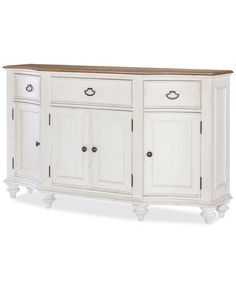 the sideboard is white and has two drawers on one side, and three doors on the