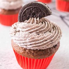 an oreo cookie cupcake with frosting on top