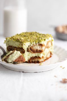 a piece of cake sitting on top of a white plate