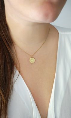 14mm 14K 9K Delicate Sun and Moon Necklace, Solid Gold Disc Necklace, Reversible 2 Sided Sun and Moon Pendant, Dainty Minimalist Layering necklace, 9K gold sun and moon necklace, Gift for her, FREE EXPRESS SHIPPING Beautiful and delicate necklace with a disc charm engraved with a crescent moon on the one side and a sun on the other. The necklace is made in 14K or 9K solid gold. She's Like the Sun and the Moon Because even on the cloudiest of days... And darkest of nights... She still find the wa Minimalist Yellow Gold Charm Necklace With Moon Phase, Minimalist Yellow Gold Moon Phase Charm Necklace, Everyday Yellow Gold Sun And Moon Necklace, Yellow Gold Moon Necklace For Everyday, Everyday Yellow Gold Moon Necklace, Everyday Moon Shaped Yellow Gold Necklace, Everyday Round Charm Necklace With Moon Phase, Everyday Yellow Gold Moon Phase Necklace, Sun And Moon Pendant