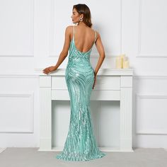 Look breathtakingly gorgeous in this Arabella Sequin Mermaid Gown Dress! Its exquisite mermaid-style silhouette is adorned with all-over glittering sequins and features a v-neckline, adjustable straps, and a backless design. Available in three dazzling colors, you’re sure to find the perfect gown for any special occasion! Neckline: V-Neck Material: Polyester Care: Cold Wash Green Sequin Dress Long, Green Sequin Dress, Gala Party, Long Sequin Dress, Party Maxi Dress, فستان سهرة, Green Sequins, Maxi Robes, Mermaid Gown