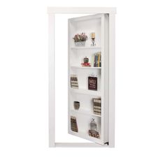 a white book shelf with several books on it