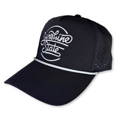 Our Sunshine State Script performance rope hat is lightweight, super breathable and the laser-perforated airflow makes it an ideal hat for warmer temperatures. The fit is just right for all. Our limited first run is available in black with grey embroidery. Performance poly fabric, five-panel design Laser-perforated side and back panels enhance airflow Woven grey rope along base of front panel Adjustable plastic snap closure - Part of the proceeds from the sale of this hat go to organizations tha Sports Mesh Trucker Hat With Flat Brim, Mesh Trucker Hat With Flat Brim For Sports, Sports Mesh Snapback Hat With Flat Brim, Mesh Snapback Hat With Flat Brim For Sports, Functional Adjustable Snapback Hat For Summer, Adjustable Functional Snapback Hat For Summer, Summer Functional Snapback Hat, Casual Black Breathable Sun Hat, Sports Mesh Baseball Cap With Flat Brim