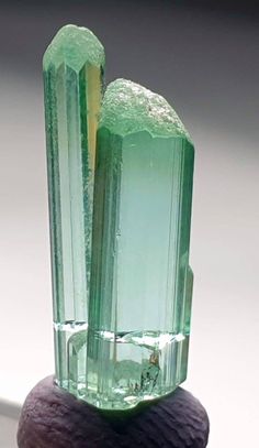 6 cts Beautiful gem quality apple green color tourmaline twin crystal from Afghanistan Apple Green Color, Beautiful Stones, Rocks And Gems, Dream House Exterior, Apple Green, Gems And Minerals, Gems Jewelry, Green Tourmaline, Green Crystals