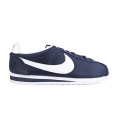 Find NIKE Classic Cortez Nylon 'obsidian on Editorialist. Marking its debut during the 1972 Munich Olympics, the Nike Cortez is Nike’s original running shoe designed by Olympic track coach Bill Bowerman. The signature style of the Classic Cortez Nylon sneaker is updated with the Nylon 'Obsidian' sneaker, featuring a lightweight nylon upper in Obsidian navy with tonal suede overlays and matching laces. A combination white and navy sole and the brand’s iconic Swoosh design in white finish this iconic sneaker staple. Sporty Navy Custom Sneakers With Branded Insole, Navy Custom Sneakers For Streetwear, Classic Navy Sneakers For Streetwear, Navy Leather Sneakers With Boost Midsole, Navy Streetwear Sneakers With Rubber Sole, Sporty Navy Custom Sneakers With Rubber Sole, Navy Sneakers With Rubber Sole For Streetwear, Navy Custom Sneakers With Rubber Sole, Navy Sporty Low-top Custom Sneakers