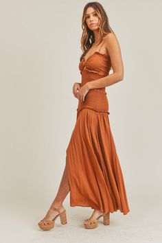 Our Cognac Proposal Smocked Maxi Dress features removable adjustable spaghetti straps so you can wear it strapless for that extra sultry look while your sitting at the pool. It has a smocked bodice, a front side slit, a bow at the bust and a small cutout detail directly under. 100% Rayon Size S: Length measures 56.5” from shoulder to hem with a 32” bust and 28” waist Size M: Length measures 57” from shoulder to hem with a 34” bust and 30” waist Size L: Length measures 57.5” from shoulder to hem Smocked Maxi Dress, Girls Smock, Backless Dress Formal, Waist Size, Red Formal Dress, Fashion Boutique, Strapless Dress Formal, Cognac, Smocking