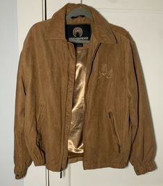 Vintage US Navy Waterproof brand Jacket Made of faux suede.  The size on the tag is small. Has a nice embroidered USN on the left chest and a cell phone pocket on the inside.  Jacket is in good condition.  Please see pictures and contact me with any questions. Fall Weatherproof Windbreaker, Brown Windbreaker For Cold Weather In Fall, Fall Brown Windbreaker For Cold Weather, Waterproof Jacket, Us Navy, Faux Suede, Leather Jacket, Navy, Leather