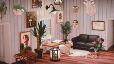 a living room filled with furniture and lots of potted plants on top of a hard wood floor