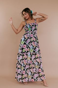 Introducing the Floral Smocked Crisscross-Back Chiffon Maxi—a breathtaking fusion of elegance and bohemian charm. This enchanting maxi dress features a delicate chiffon fabric adorned with a vibrant floral print, evoking the vibes of springtime romance. Perfect for special occasions or a day out in the sun, this dress effortlessly captures the whimsy of boho chic style. Floral Maxi dress Smocked detailing Adjustable straps Functional side pockets Tie sleeves Criss cross detail on upper back Open Easter Maxi Dress, Easter Sunday Dress, Spring Wedding Guest Dress, Boho Chic Style, Spring Floral Dress, Family Photo Outfits, Chiffon Maxi, Smocked Dress, Wedding Guest Dress Summer