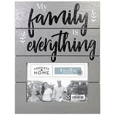 a family is everything magnet with the words in black and white on it's side