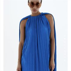 Fun Short Dress, Bright Blue, Pleated, With Cape Like Detail. Spring Royal Blue Maxi Dress, Royal Blue Spring Maxi Dress, Blue Pleated Midi Dress For Spring, Blue Midi-length Pleated Dress For Spring, Royal Blue Pleated Summer Dress, Blue Pleated Mini Dress For Spring, Chic Royal Blue Beach Dress, Blue Sleeveless Pleated Summer Dress, Blue Sleeveless Pleated Dress For Spring