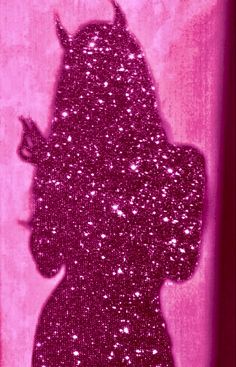 the silhouette of a woman with long hair is shown in pink and white glitters