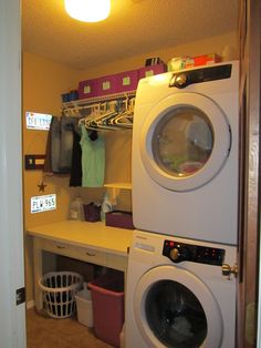 a washer and dryer in a small room