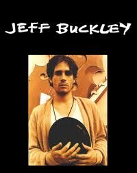 a man holding a hat in his hands with the words jeff buckley on it