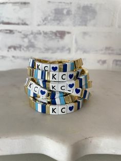 One size fits most KC heart stretch bracelet.  Just slide on your wrist. Great for Kansas City Royals Baseball game days or to just show your KC pride! Adjustable Blue Stackable Stretch Bracelet, Blue Adjustable Stackable Stretch Bracelet, Blue Stackable Bracelets For Gift, Blue Stackable Bracelets As Gift, Blue Jubilee Bracelet For Everyday Wear, Blue Jubilee Stretch Bracelet, Blue Stackable Stretch Bracelet For Everyday, Everyday Blue Jubilee Bracelet, Everyday Stackable Blue Bracelets