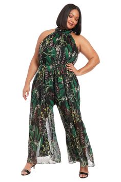 Dazzle in the Godiva jumpsuit featuring a halter mock-neck, sleeveless design, and waist tie detail. The alluring floral print makes it the perfect choice for any special occasion. Sleeveless Floral Print Party Jumpsuits And Rompers, Sleeveless Floral Print Jumpsuits For Party, Spring Floral Print Halter Neck Jumpsuit, Floral Print Halter Neck Jumpsuits For Spring, Chic Halter Neck Jumpsuit With Floral Print, Spring Floral Print Halter Neck Jumpsuits And Rompers, Chic Floral Print Halter Neck Jumpsuit, Floral Print Halter Neck Jumpsuits And Rompers For Spring, Chic Floral Print Jumpsuits And Rompers For Garden Party