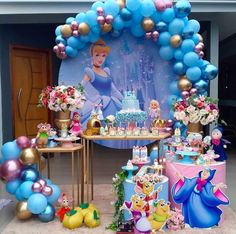 a birthday party with balloons, cake and decorations