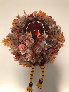 a turkey made out of paper and leaves