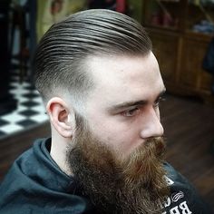 Slicked Back Fade with Beard Fade With Beard, Hawk Haircut, Skin Fade Hairstyle, Types Of Fade Haircut, Slick Back Haircut, Low Taper Fade Haircut, Fade Haircuts For Men, Slicked Hair, Photos Of Men