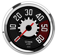 an analog clock with red and white numbers