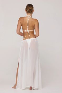 Athena Skirt in White – RESA White Sheer Beachwear Cover-up, Elegant Fitted Beach Sarong, Elegant Fitted Sarong For Beach, Fitted Sheer Cover-up For Beach Party, Flowy Party Beachwear Cover-up, Flowy Maxi Skirt For Summer Wedding, Chic Fitted Maxi Skirt For Beach, Elegant Backless Beach Dress, Summer Wedding Flowy Maxi Skirt