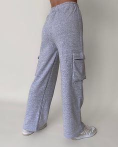 Stay fashionably comfortable with our fleece cargo pocket straight leg sweat pants. Cozy brushed fleece, cargo pockets, and an adjustable drawstring combine style and function effortlessly. A must-have for your wardrobe! More Details: - Fits true to size for most - Does stretch - 60% COTTON 40% POLYESTER - Color may vary due to the lighting - Model is wearing a size small *If you are taller than 5'7, they may fit short. Model Details Height 5'5 | Chest 32" Cup size A | Waist 25" Hips 35.5" | Wei Sweat Cargo Pants, Cargo Sweats, Rave Fits, Xmas List, Cargo Pocket, Fleece Pants, Sweat Pants, Winter Clothes, Cup Size