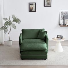 a green chair sitting on top of a white rug