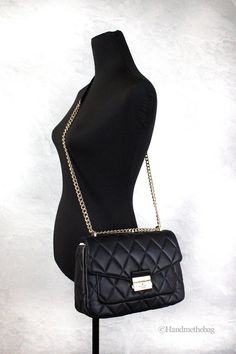 Style: Kate Spade Carey Medium Black Quilted Flap Shoulder Bag Material: Smooth Leather Features: Adjustable Chain and Leather Strap, Inner Zip and Slip Pockets, Outer Slip Pockets, Jacquard Lining Measures: 11" L x 7" H x 3" D Elegant Quilted Party Bag, Luxury Quilted Party Bag, Black Quilted Evening Bag, Chic Quilted Evening Bag, Luxury Kate Spade Crossbody Shoulder Bag, Luxury Kate Spade Shoulder Bag With Adjustable Strap, Elegant Quilted Clutch Shoulder Bag, Kate Spade Rectangular Shoulder Bag With Chain Strap, Chic Kate Spade Shoulder Bag With Chain Strap