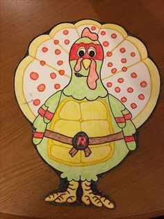 a paper plate with a turkey on it