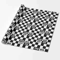 a black and white checkerboard wrapping paper with the words big six on it