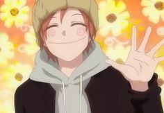 an anime character is smiling and making the peace sign with her hands while wearing a hoodie