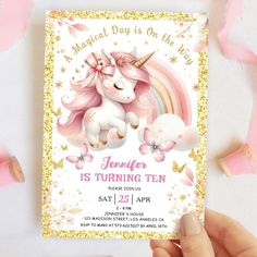 a pink and gold unicorn birthday party card