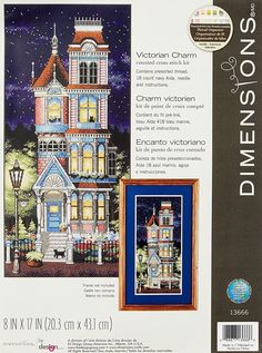 the cross stitch pattern for this house has been designed to look like an old victorian home